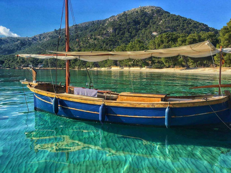 The Sublime Northern coast on a traditional Llaüt